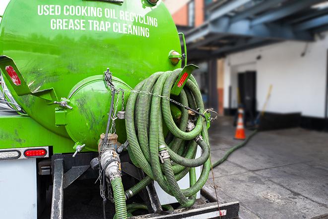 routine pumping of grease trap at a cafeteria in Auburn CA